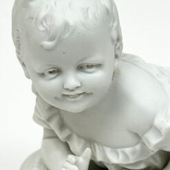 Porcelianinė kūdikio statula 8x17x10,5 cm