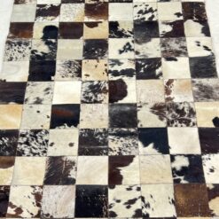 Skiautinis natūralaus kailio kilimas 228x159x0,2 cm