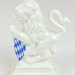 Porcelianinė Nymphenburg liūto statula “Löwe Pranke rechts” 7x4x9,5 cm