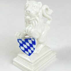 Porcelianinė Nymphenburg liūto statula “Löwe Pranke rechts” 7x4x9,5 cm