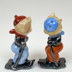 Porcelianinės Goebel druskinė ir pipirinė slidininkų figūrėlės 2 vnt. kompl.