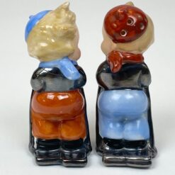 Porcelianinės Goebel druskinė ir pipirinė slidininkų figūrėlės 2 vnt. kompl.