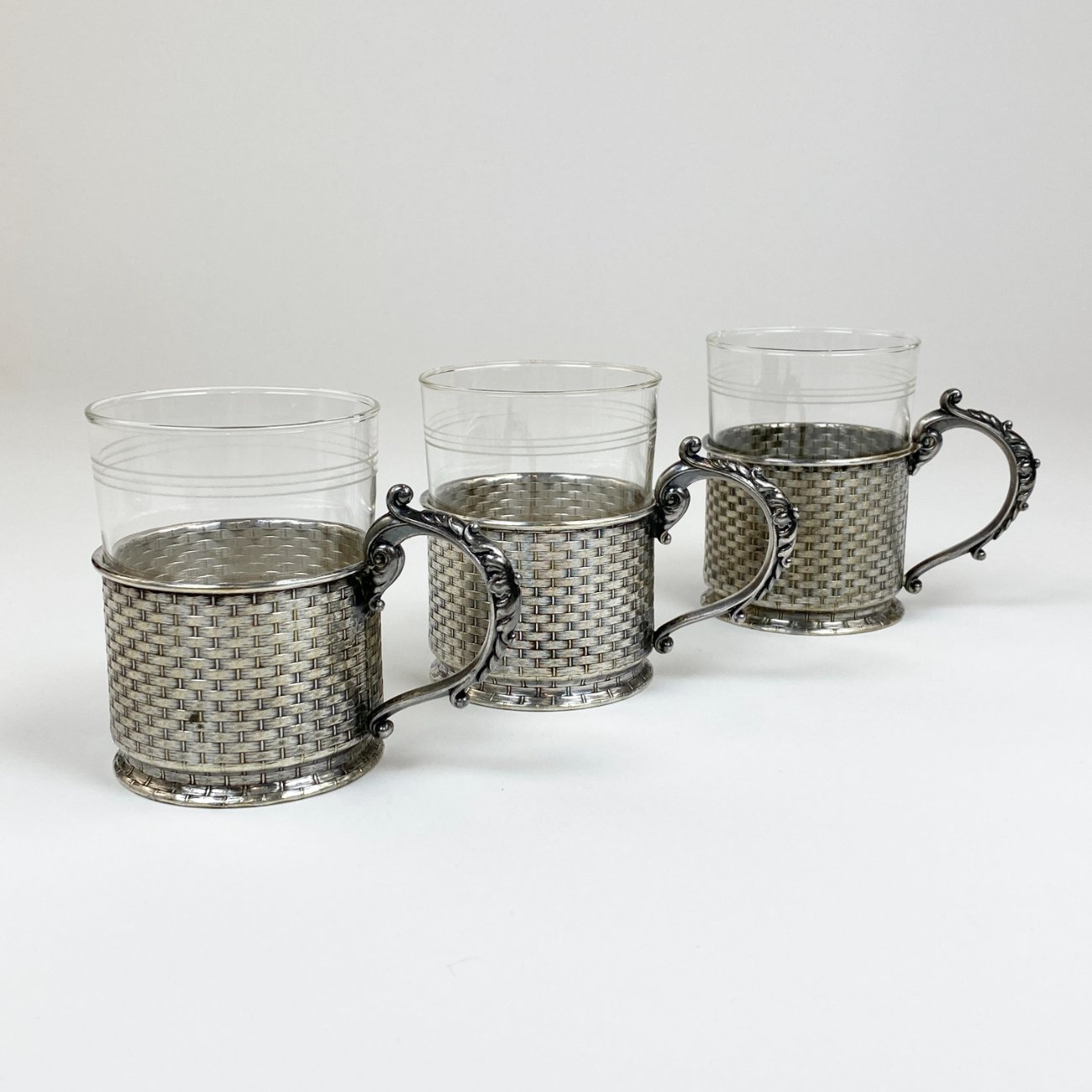 HN2382-kiti-indai-0 Schott & Gen. Jena stiklo stiklinės su sidabruoto metalo laikikliais po 220 ml 3 vnt. komplektas 7x11x9,5 cm