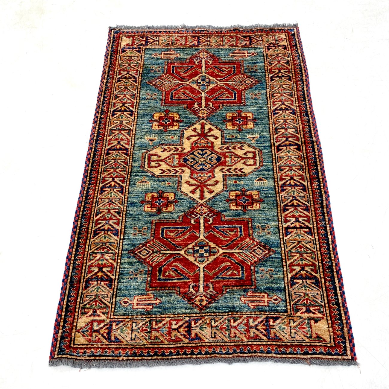 DR0447-kilimai-0 Vilnonis rankų darbo kilimas 141x83x0,5 cm