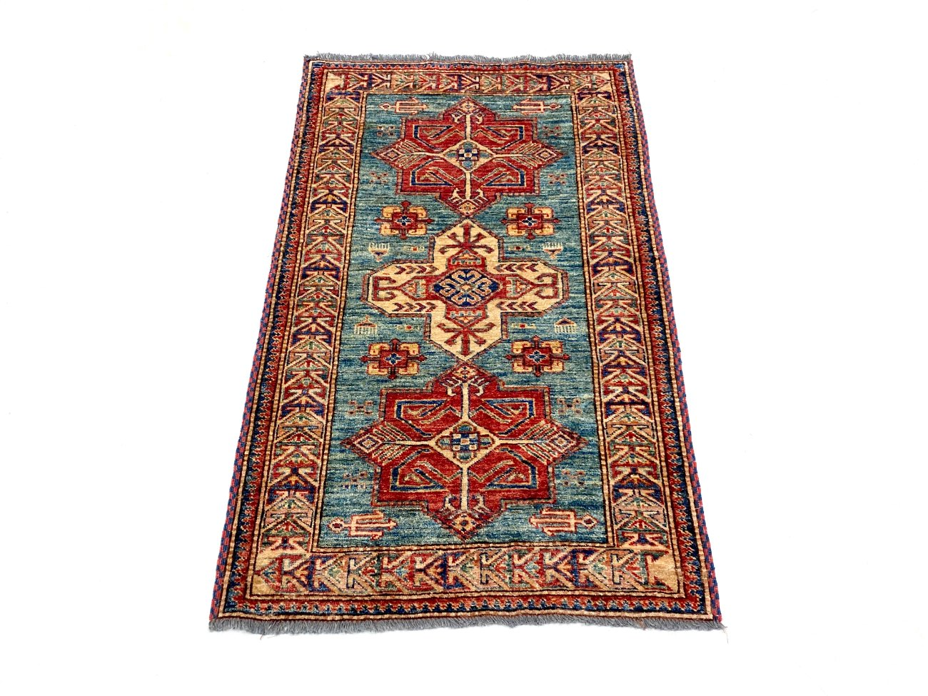 DR0447-kilimai-2 Vilnonis rankų darbo kilimas 141x83x0,5 cm