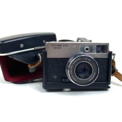 Vintažinis vokiškas Agfa Optima 500 Sensor juostinis fotoaparatas su odiniu dėklu 7×14,5×9 cm