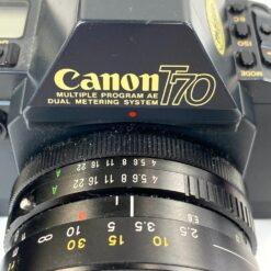 Vintažinis japoniškas Canon T70 juostinis fotoaparatas su Tokina SZ-X 28-105mm objektyvu 15,5×15,5×9,5 cm