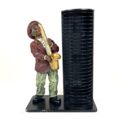 Stalinė CD kompaktų lentyna su saksofonisto figūra 17x34x46 cm