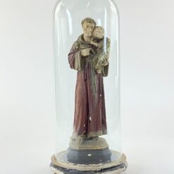 Šv. Antano Paduviečio, laikančio Kūdikėlį Jėzų statula iš gipso su mediniu postamentu ir stikliniu gaubtu 22x22x52 cm