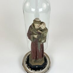 Šv. Antano Paduviečio, laikančio Kūdikėlį Jėzų statula iš gipso su mediniu postamentu ir stikliniu gaubtu 22x22x52 cm