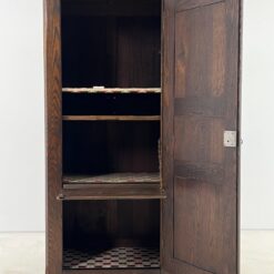 Tamsiai ruda siaura ąžuolo masyvo vienų durų spinta 52x77x169 cm